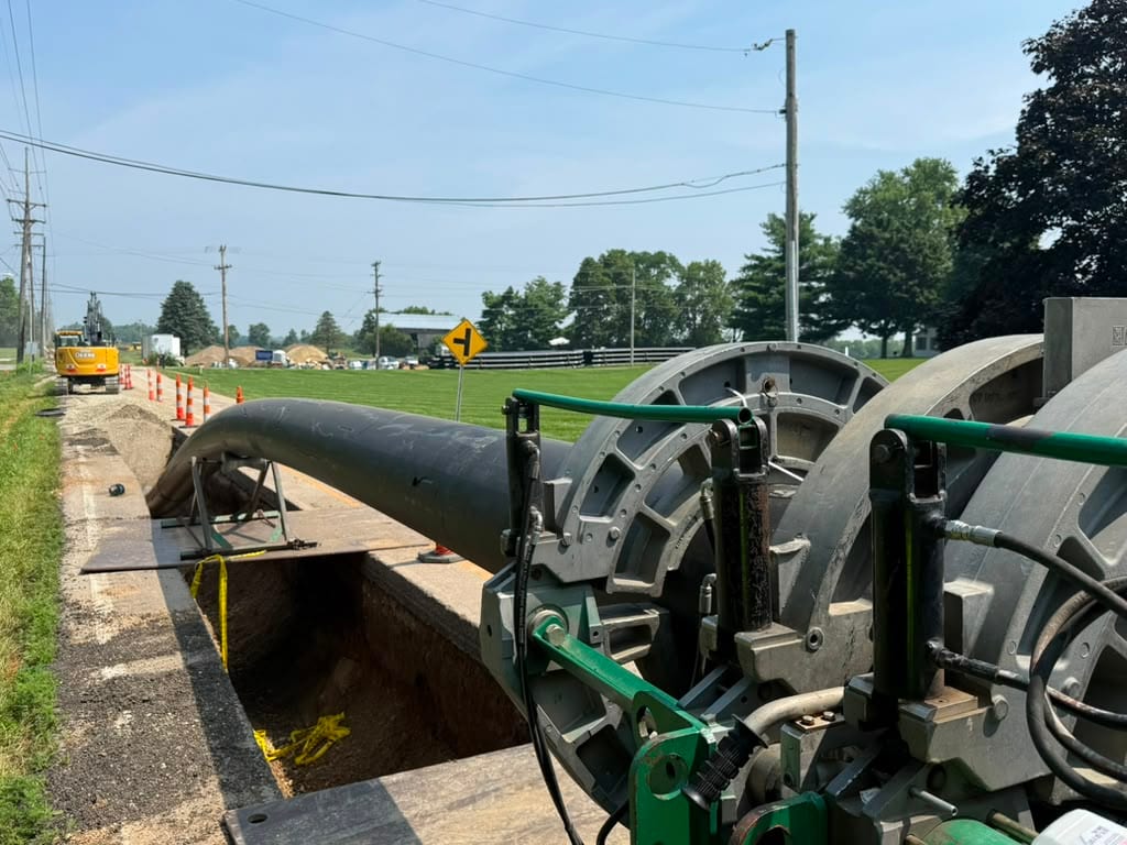 Fusion machine positioned over an open trench