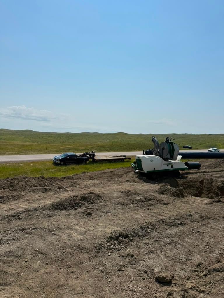 Mobile HDPE fusion setup in an open field